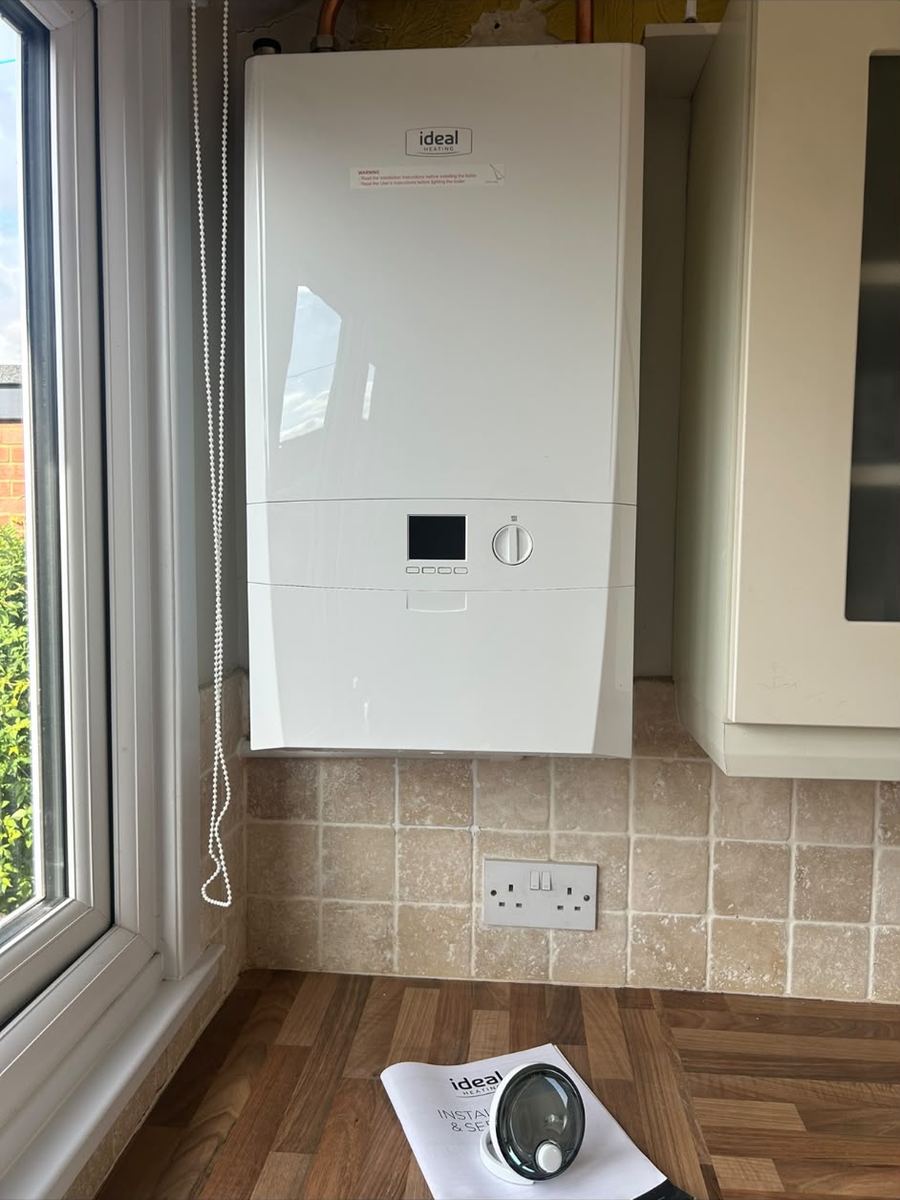 New boiler installed beside a kitchen window