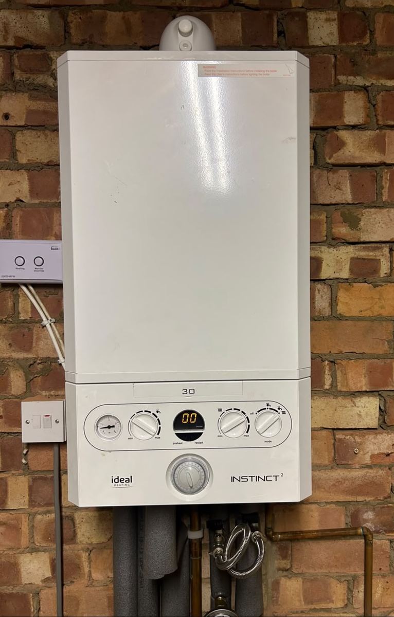 Ideal boiler fitted on a brick wall