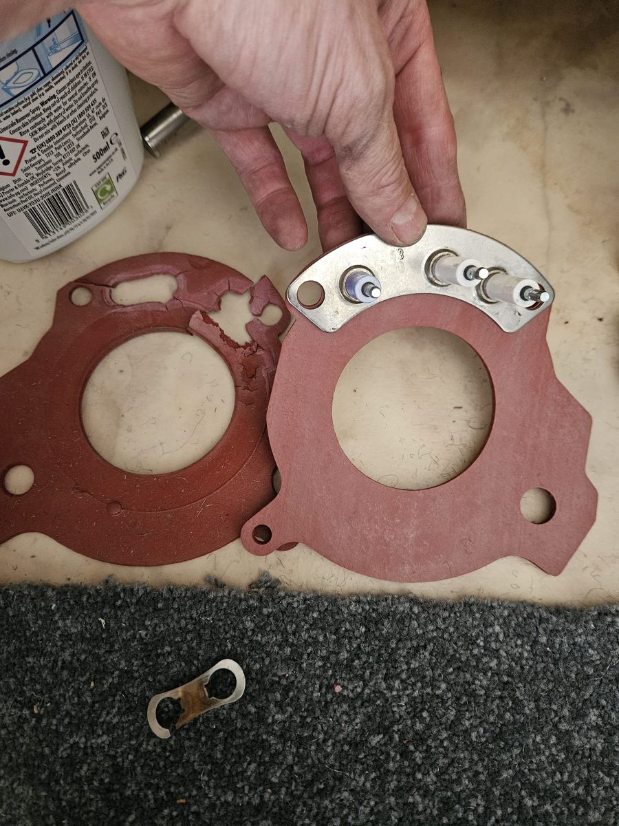 Fitting a new burner gasket during a boiler repair